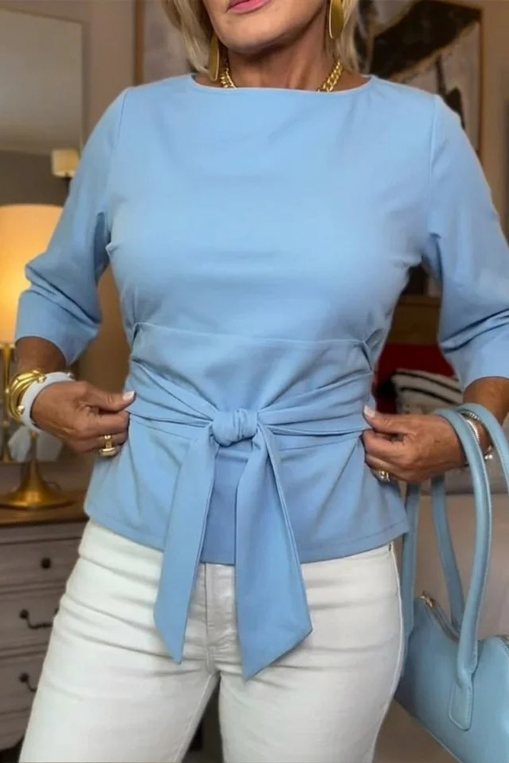 Conception Elegant top with a bow at the waist