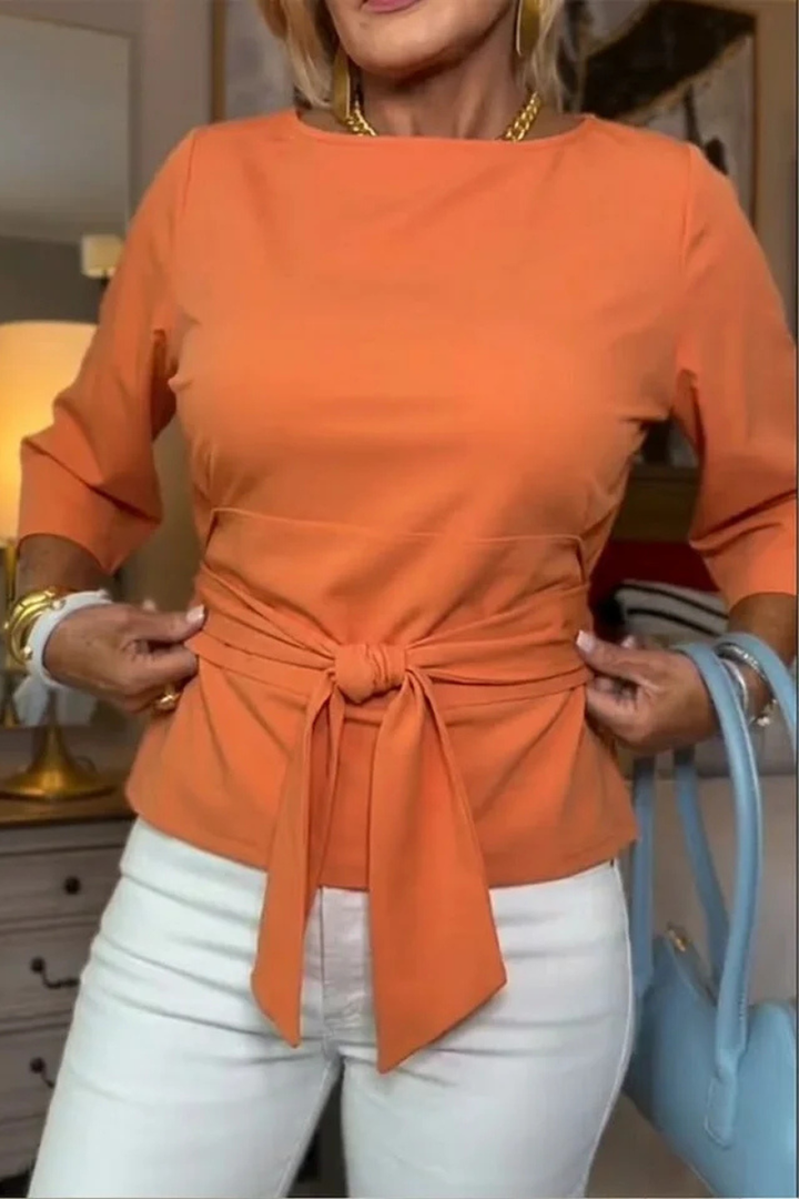 Conception Elegant top with a bow at the waist