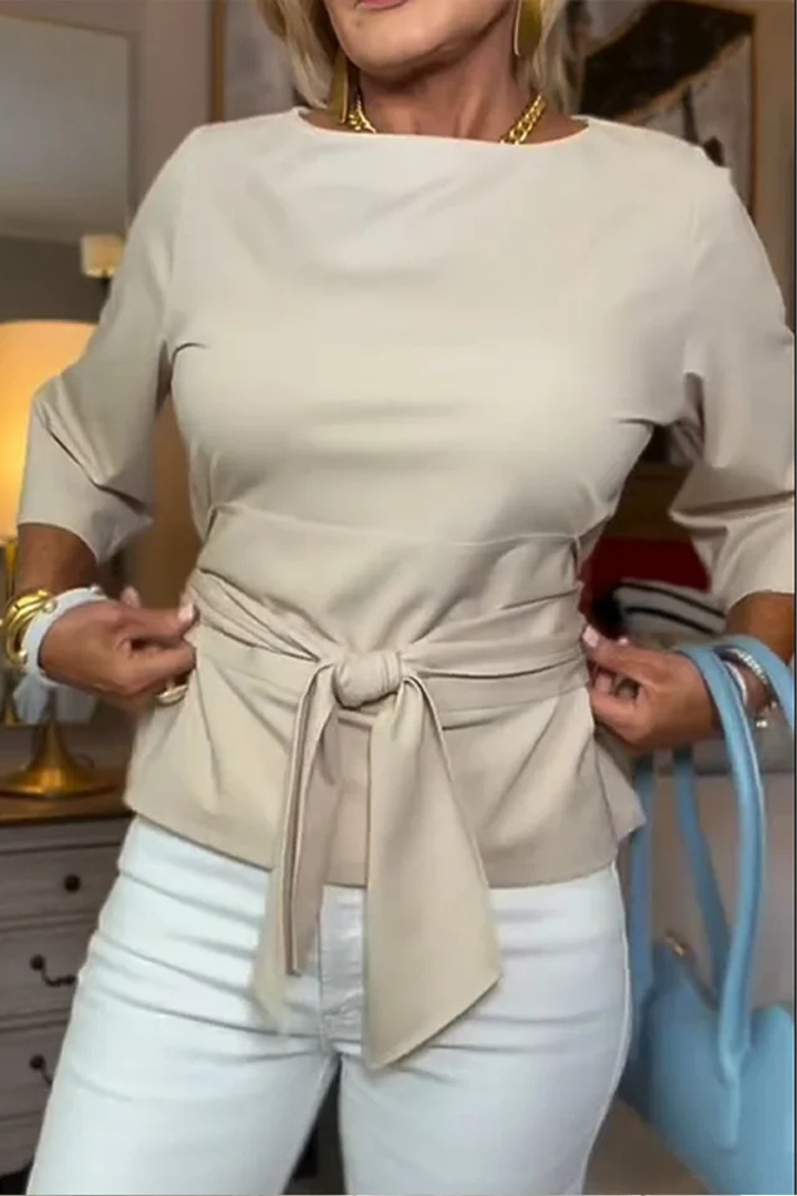 Conception Elegant top with a bow at the waist