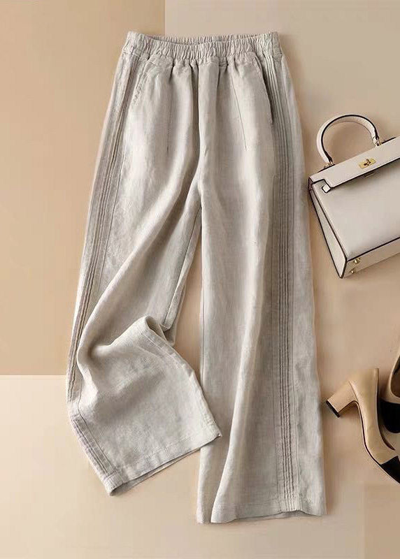 Lässige Leinenfarbe, gekräuselte, elastische Taille, drapierte Leinenhose mit weitem Bein, Sommer