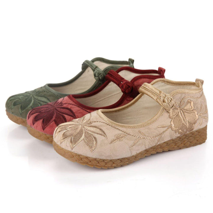 Stylish flat-foot shoes with buckle straps, green embroidered cotton fabric