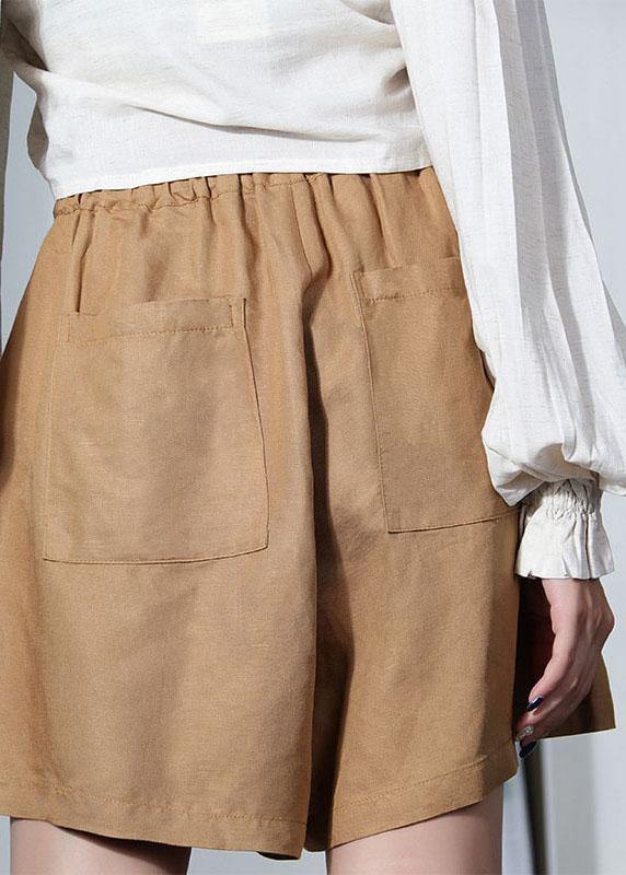 Elegant brown linen pants with high waist pockets and wide leg