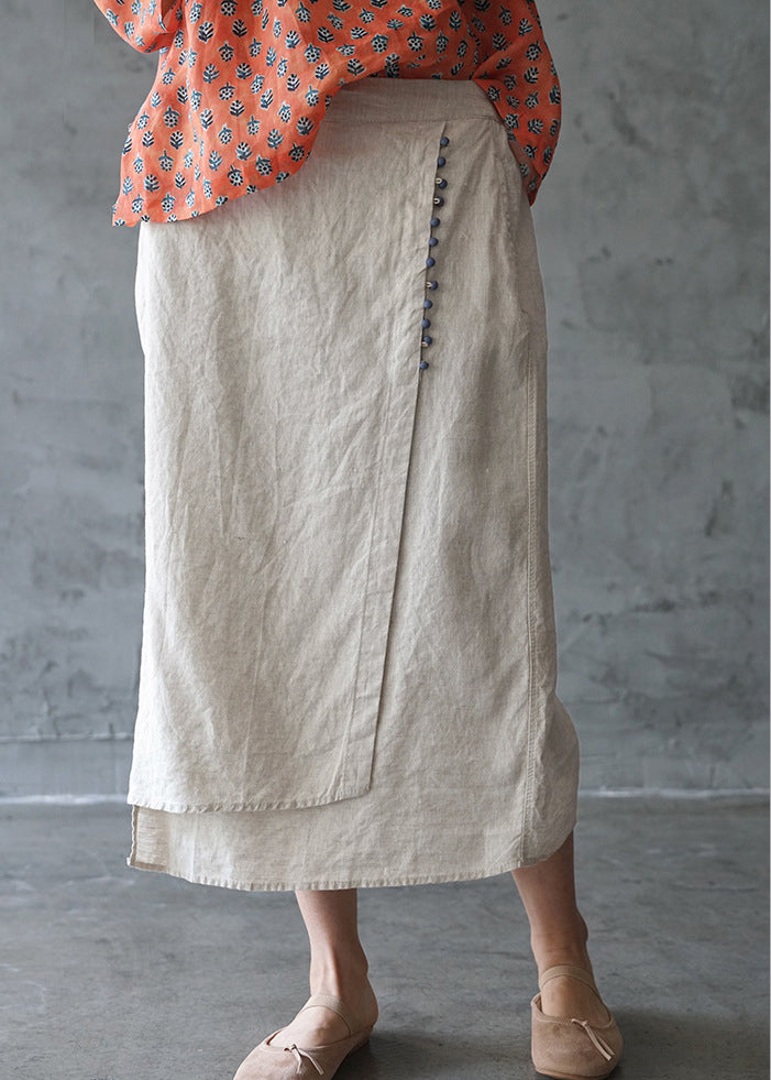 Feine beige elastische Taille asymmetrisches Taschendesign Leinenröcke Frühling