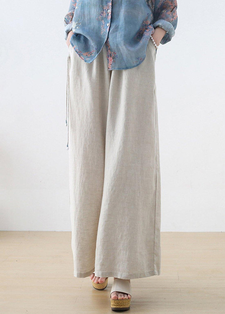 Handgemachte beige elastische Taillen-Leinenhose mit weitem Bein